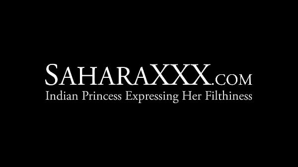 Sexy Sahara Knite spreads her unshaved pussy